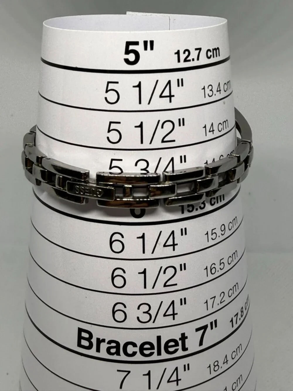 Guess Women's Silver-Tone Crystal Accented Rectangular Bracelet Watch